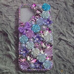 Unbranded Pretty Blue Floral Gemstone W/ Purple Bow💜 IPhone 16 Case (BRAND NEW)
